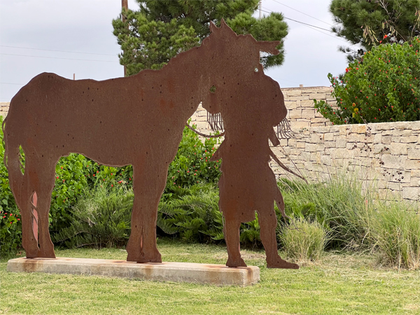silhouette representing a Commanche hunting post at Comanche Springs