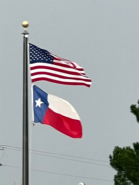 The USA flag and the Texas flag