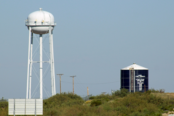 An unmarked water tower and a water tank in Fort Hancock