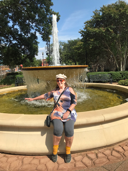 Karen Duquette and the water fountain at Everman Park