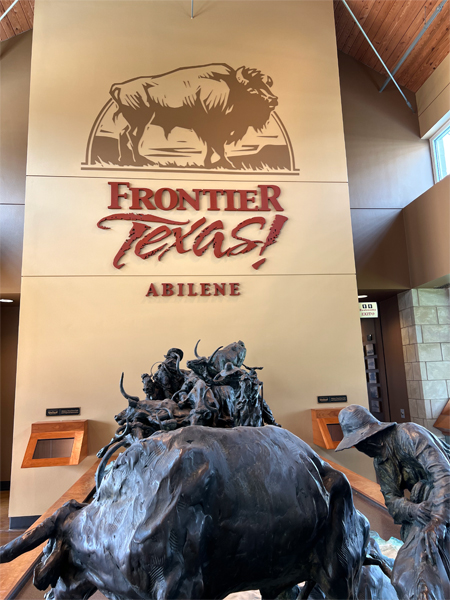 Frontier Texas Abilene banner and statues