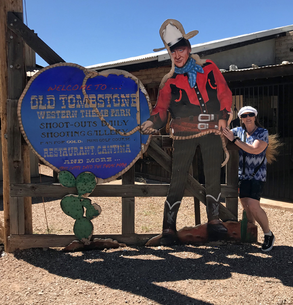 Karen Duquette and a giant cowboy