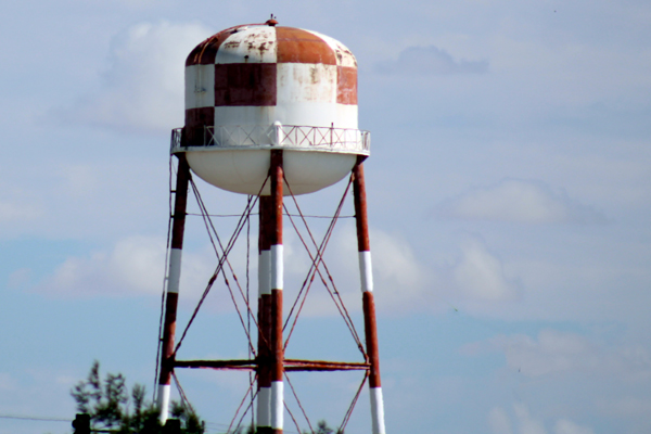 red and white checkered water tower