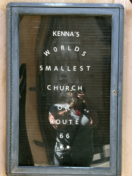worlds smallest church on Route 566 sign