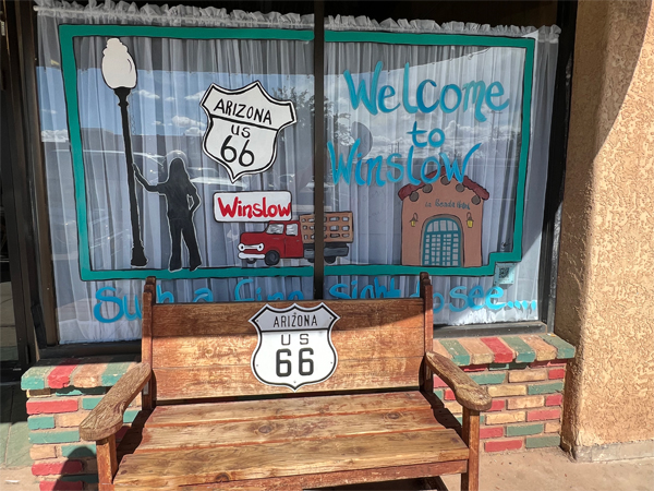 Route 66 bench and store in Winslow AZ