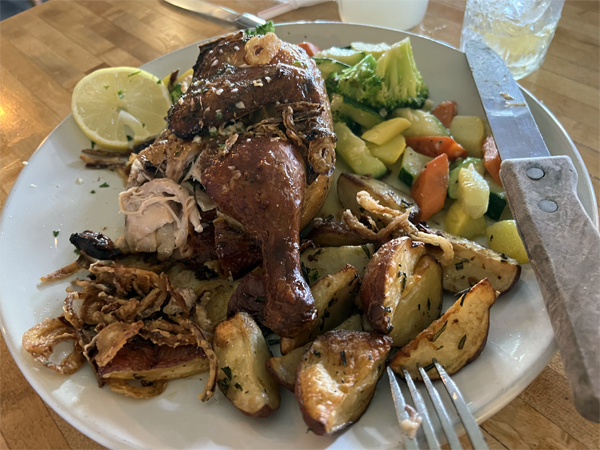 chicken dinner with roasted potatoes and sauteed veggies
