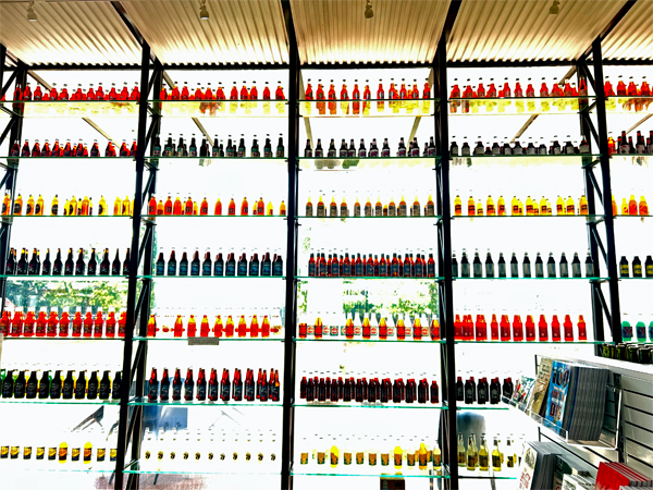 shelves decorated with colorful bottles,