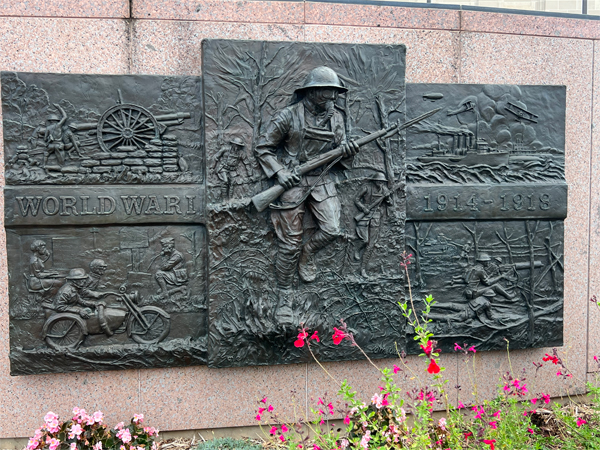 bronze panel representing World War I,