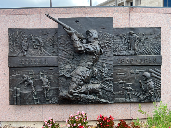 bronze panel representing The Korean War