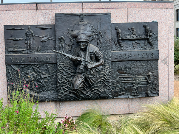 bronze panel representing The Vietnam War