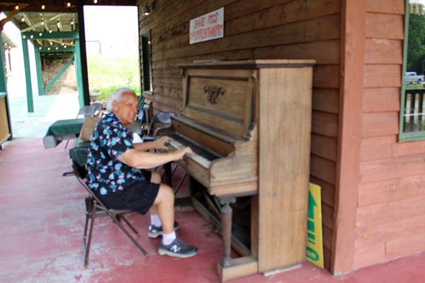 Lee Duquette playing the piano