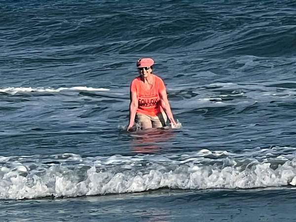 Karen Duquette playing im the oceacn at Sunset Beach
