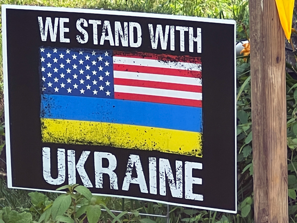We Stand With Ukraine sign