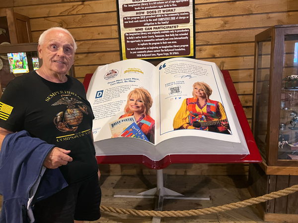 Lee Duquette and Dolly's Imagination Library book