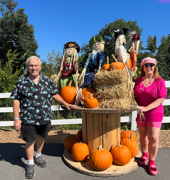 The two RV Gypsies with pumpkins and scarecrows