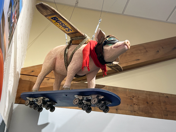 Bush's flying pig on a skate board