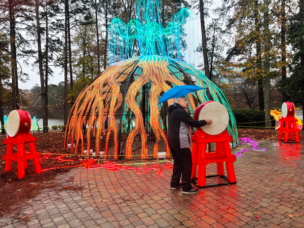 Lee Duquette beating on the drum at the Tree of Life