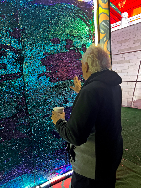 Lee Duquette and a colorful board of beads