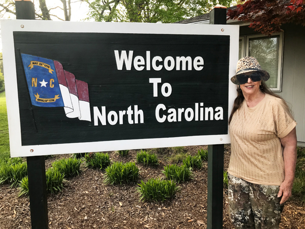 Karen Duquette and welcome to North Carolina sign