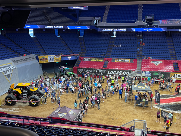 the pits, monster trucks and people