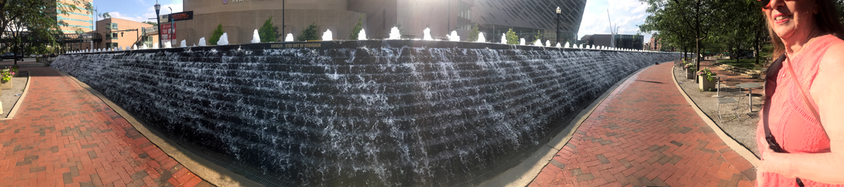 Karen Duquette at the cascading water wall