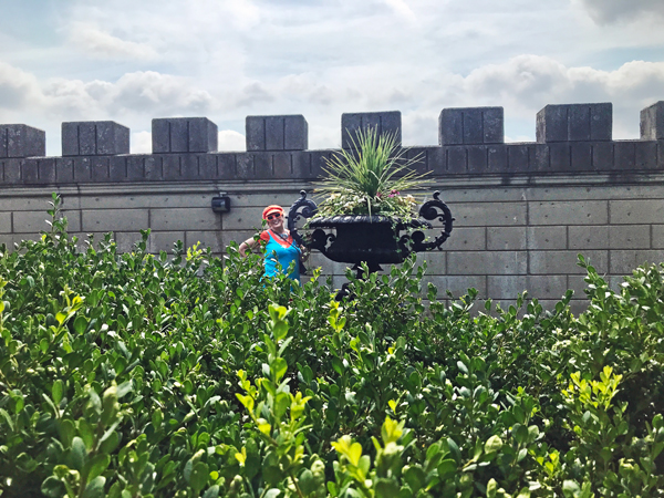 Karen duquette by the big flower pot