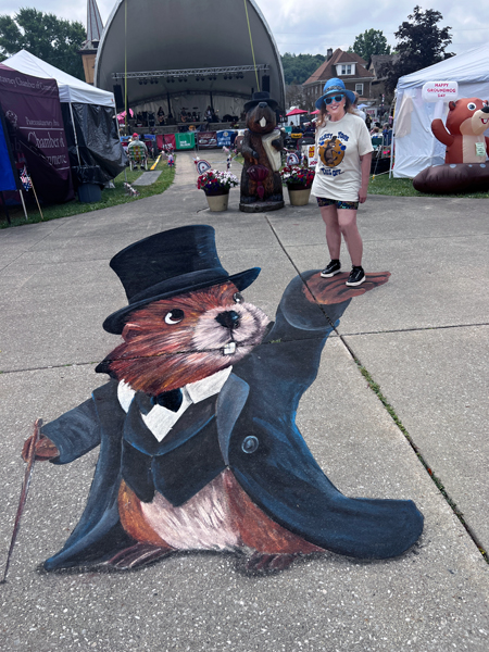 Punxsutawney Phil holding Karen Duquette