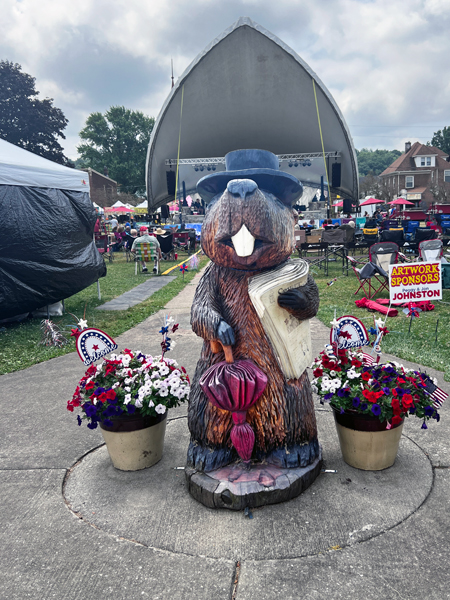 groundhog statue and concert band