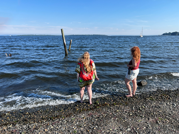 Karen Duquette and her sister by the water