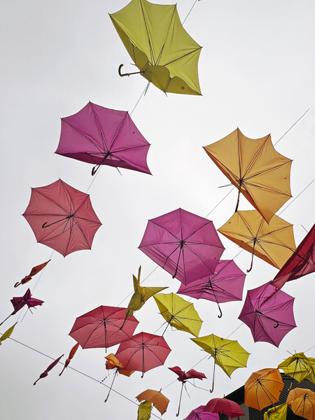 colorful umbrellas overhead