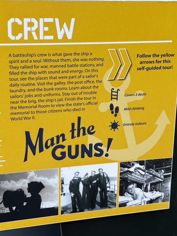 Man the guns sign