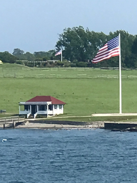 lighouse boat dock ad USA flags