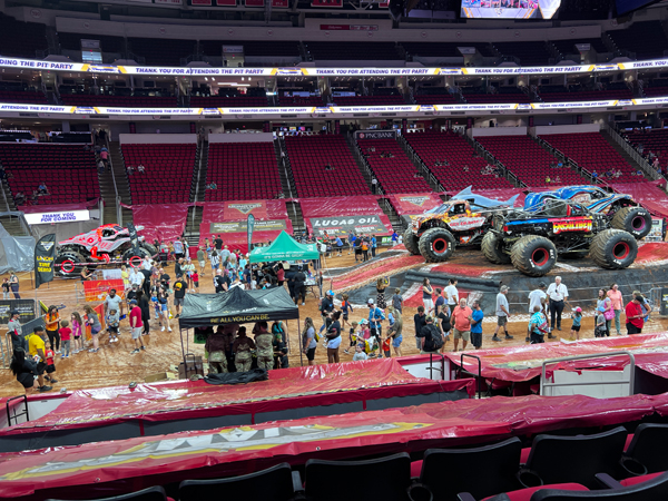 monster trucks and lots of poeple