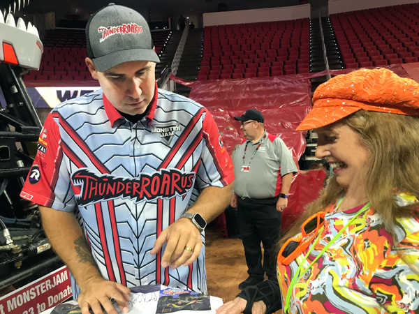 ThunderROARus Monster Truck and driver, Tony Ochs with Karen Duquette