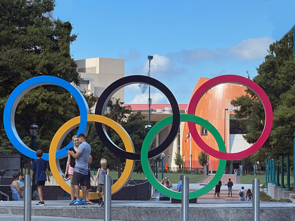 Olympic rings and lots of people