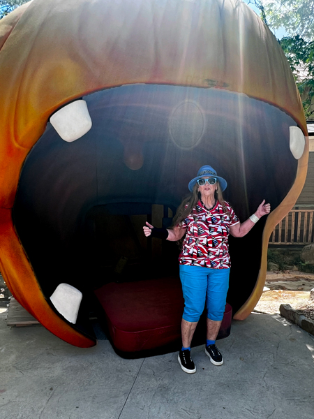 a big pumpkin trying to bite Karen Duquette