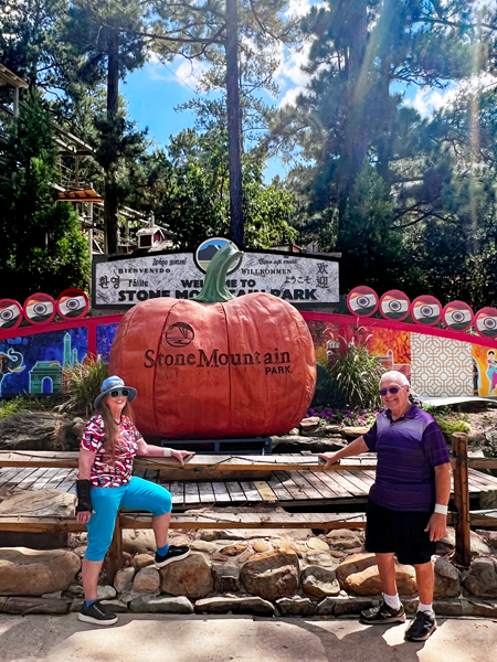 Karen and Lee Duquette and a big pumpkin