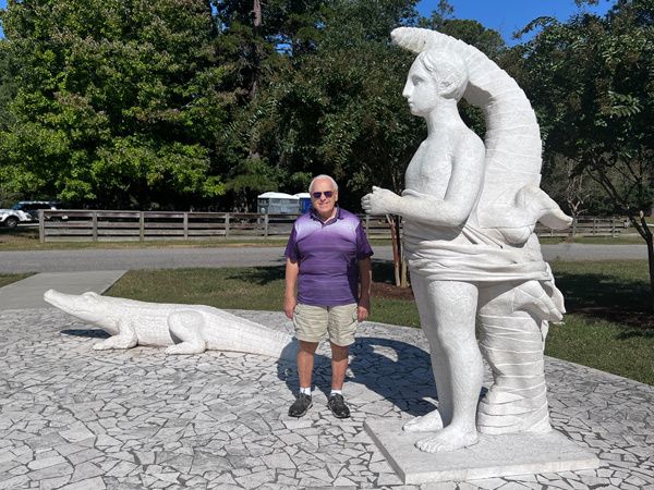 Lee Duquette at the Man and Crocodile statue 