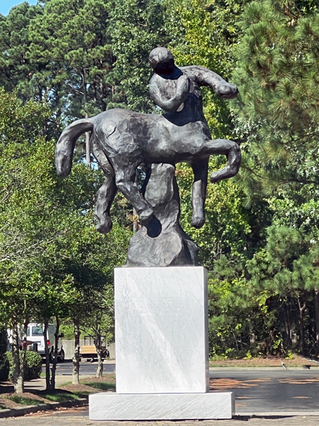 human and horse statue