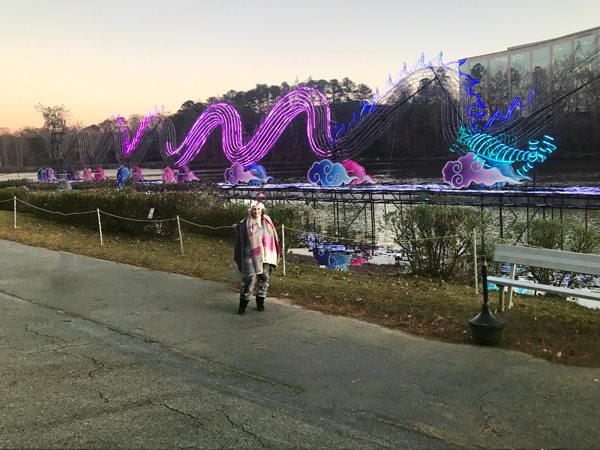 Karen Duquette in front of the 2024 Dragon