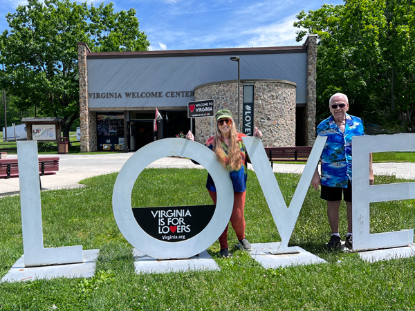 Lee and  KarenDuquette at the Love sign