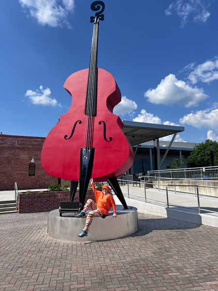 Karen Duquette and the giant guitar