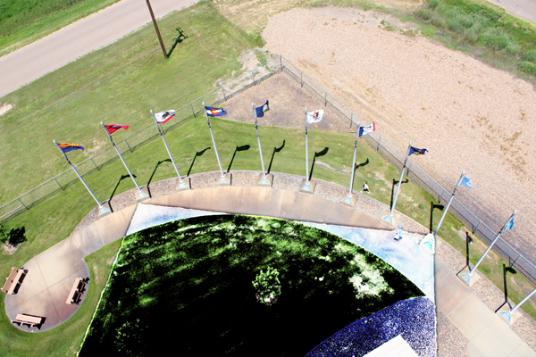 courtyard that proudly displays 23 flags
