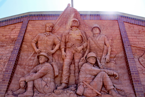 The middle photo at the top side of the memorial