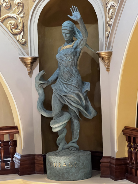 Courage Sister with a snake