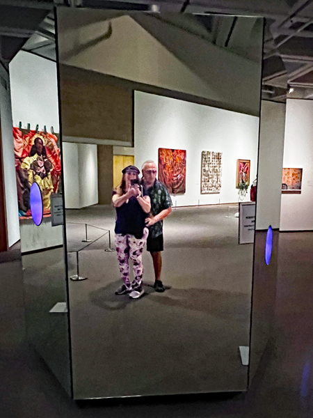 Karen and Lee Duquette in the mirror