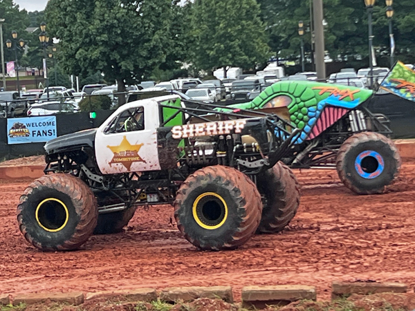 T-Rex and Sheriff Monster Trucks
