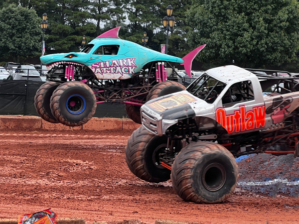 Outlaw and Shark Attack Monster trucks