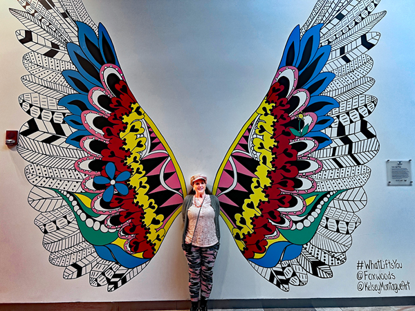 Karen Duquette with wings