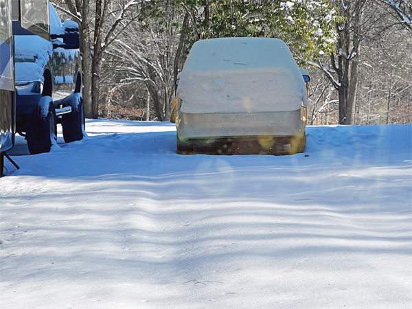 car  covered in snow
